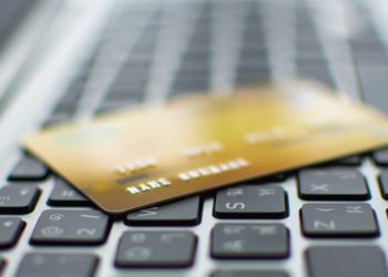 FinTech Behind Cardano’s First Stablecoin Launches Bank Accounts And Visa Debit Cards