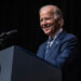 Biden urges technology firms to prioritize safety in AI development