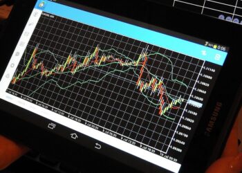 Bitcoin Holds Above $27K; XRP, ADA, DOGE Trade Little Changed
