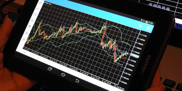 Bitcoin Holds Above $27K; XRP, ADA, DOGE Trade Little Changed