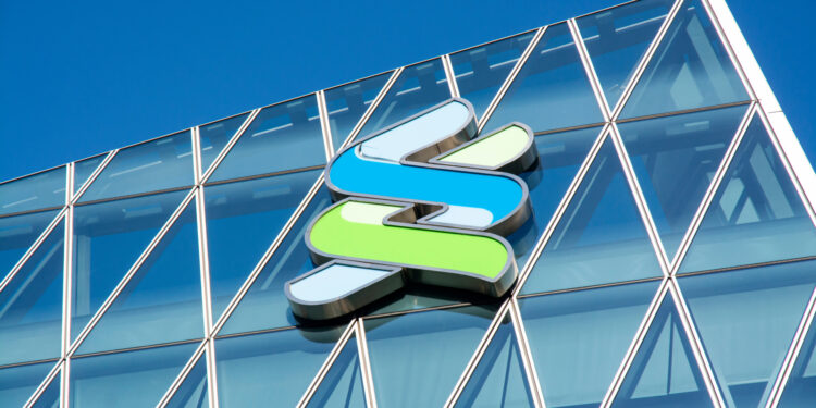 Standard Chartered Swaps Tesla for Bitcoin in ‘Mag 7B’ Index for Higher Returns, Lower Volatility