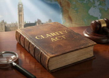 Hoskinson Targets Clarity Act and Ripple’s Compliance Stance