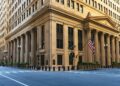 Crypto Markets Slip as Fed Holds Rates Steady, Signals Hawkish Outlook